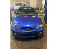 Mazda Protege DX 1998−2004