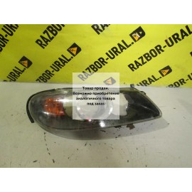 Стекло правой фары бу Almera N16 Nissan 2002-2006